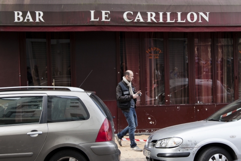  Criminal police investigates scene outside the Carillon bar in Paris, France.