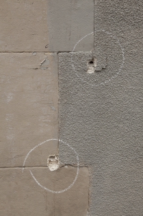  Bullets holes seen on the wall near the bar Le Carillon in Paris, France.